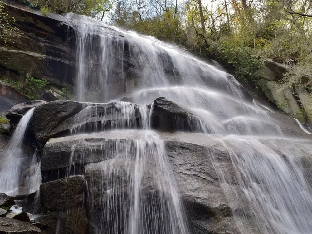 Daniel Ridge Falls, a 150-foot waterfall on Tom's Spring Branch in Pisgah National Forest