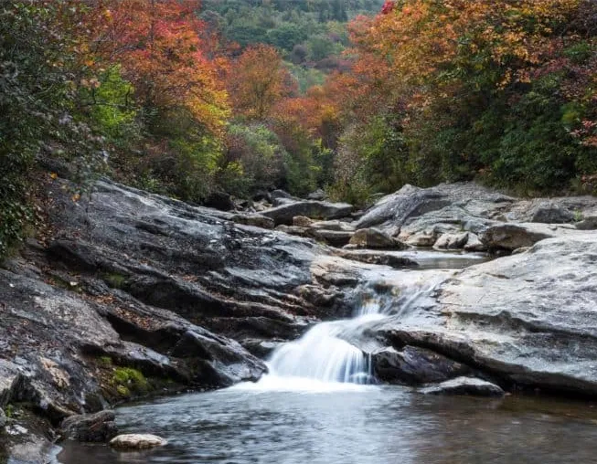 Waterfall and autumn foliage at Graveyard Fields off the Blue Ridge Parkway